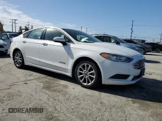 2017 Ford Fusion Hybrid SE with VIN 3FA6P0LU0HR384609, listed as a Copart auction lot 49103125 with 105,976 mi miles and Salvage title. Bid and sale history available at DreamBid. Image 4.