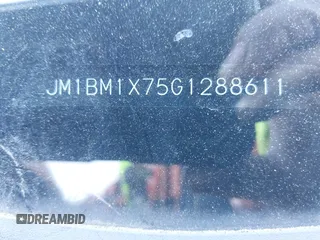 2016 Mazda Mazda3 i Grand Touring with VIN JM1BM1X75G1288611, listed as a IAAI auction lot 42001357 with 107,830 mi miles. Bid and sale history available at carsss.com. Image 17.