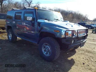 2005 Hummer H2 SUV with VIN 5GRGN23U15H117796, listed as a IAAI auction lot 41543913 with 195,560 mi miles. Bid and sale history available at carsss.com. Image 1.