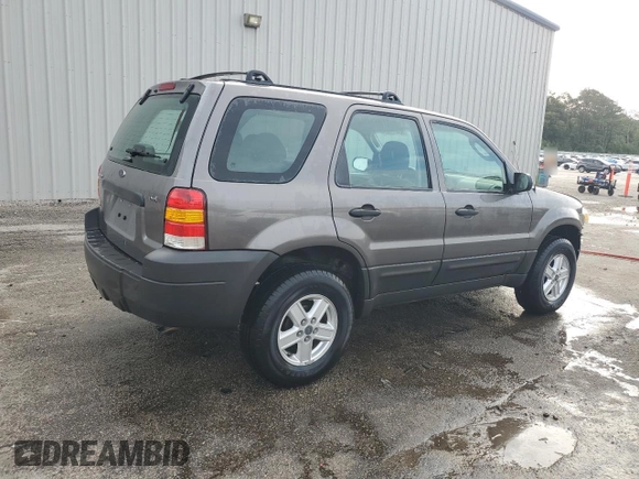 2006 Ford Escape XLS with VIN 1FMYU02Z66KA18952, listed as a Copart auction lot 60472305 with 221,258 mi miles and Salvage title. Bid and sale history available at DreamBid. Image 3.