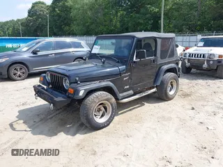 2002 Jeep Wrangler Sport with VIN 1J4FA49S32P700831, listed as a IAAI auction lot 42626269 with 182,870 mi miles and . Bid and sale history available at DreamBid. Image 2.