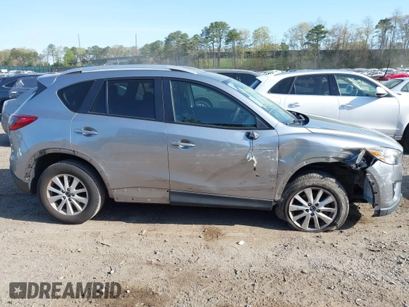 2014 Mazda CX-5 Touring with VIN JM3KE4CY0E0302583, listed as a IAAI auction lot 41947735 with 122,077 mi miles. Bid and sale history available at carsss.com. Image 13.