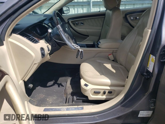 2014 Ford Taurus Limited with VIN 1FAHP2F84EG149622, listed as a Copart auction lot 63764675 with 208,801 mi miles and Salvage title. Bid and sale history available at DreamBid. Image 7.