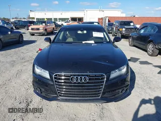2013 Audi A7 3.0 Prestige with VIN WAU2GAFC2DN065112, listed as a IAAI auction lot 41117426 with 159,105 mi miles. Bid and sale history available at carsss.com. Image 13.