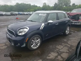 2014 MINI Countryman S z VIN WMWZC5C5XEWP36643, wystawiony jako Copart lot #60142695 z przebiegiem 116 497 mil mil oraz Szkoda całkowita • Salvage title. Historia ofert i sprzedaży dostępna na DreamBid. Obrazek 1.