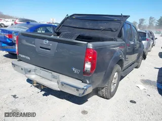 2013 Nissan Frontier SV with VIN 1N6AD0ERXDN744081, listed as a IAAI auction lot 41639057 with 141,102 mi miles. Bid and sale history available at carsss.com. Image 4.