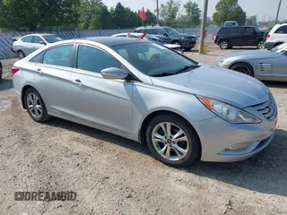 2012 Hyundai Sonata SE z VIN 5NPEC4AC5CH450408, wystawiony jako IAAI lot #42459494 z przebiegiem 103 836 mil mil oraz . Historia ofert i sprzedaży dostępna na DreamBid. Obrazek 1.