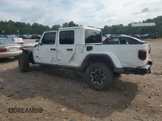 2020 Jeep Gladiator Rubicon с VIN 1C6JJTBG6LL102474, выставлен на аукционе Copart как лот 60377785 с пробегом 56 422 миль миль и Списание • Salvage title. История ставок и продаж доступна на DreamBid. Изображение 2.