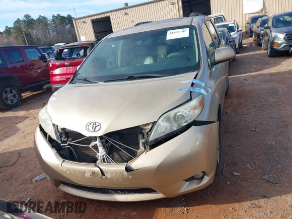 2011 Toyota Sienna XLE AAS with VIN 5TDYK3DCXBS117023, listed as a IAAI auction lot 41581785 with 216,341 mi miles. Bid and sale history available at carsss.com. Image 12.