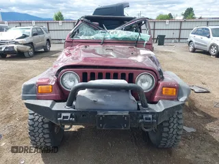2003 Jeep Wrangler X z VIN 1J4FA39S73P349014, wystawiony jako IAAI lot #42582747 z przebiegiem 50 525 mil mil oraz . Historia ofert i sprzedaży dostępna na DreamBid. Obrazek 13.