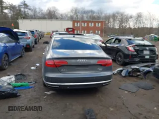 2015 Audi A8 L 4.0T with VIN WAU32AFD4FN041084, listed as a IAAI auction lot 41450453 with 86,199 mi miles. Bid and sale history available at carsss.com. Image 16.
