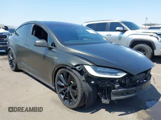 2016 Tesla Model X P90D z VIN 5YJXCAE47GF005120, wystawiony jako IAAI lot #42247478 z przebiegiem 65 378 mil mil oraz . Historia ofert i sprzedaży dostępna na DreamBid. Obrazek 1.