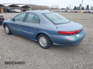 1999 Mercury Sable LS z VIN 1MEFM53S5XA647862, wystawiony jako IAAI lot #41762714 z przebiegiem 165 490 mil mil oraz . Historia ofert i sprzedaży dostępna na DreamBid. Obrazek 3.