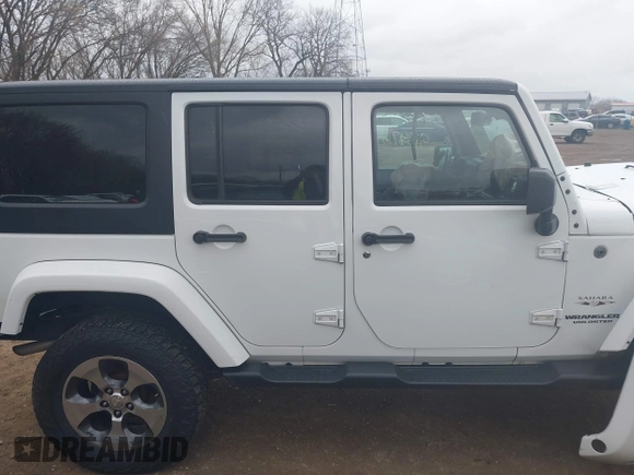 2017 Jeep Wrangler Unlimited 75th Anniversary z VIN 1C4BJWEG9HL684152, wystawiony jako IAAI lot #41880074 z przebiegiem 91 847 mil mil oraz . Historia ofert i sprzedaży dostępna na DreamBid. Obrazek 13.