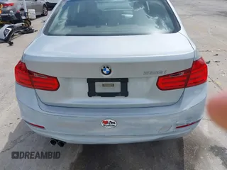 2013 BMW 3 Series 328i with VIN WBA3C1C59DK105001, listed as a IAAI auction lot 41923155 with 73,810 mi miles. Bid and sale history available at carsss.com. Image 17.