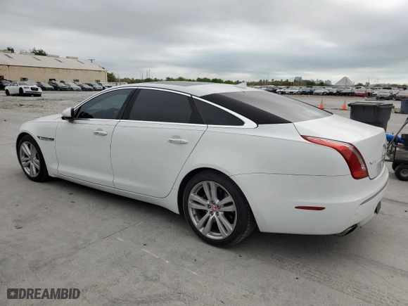 2014 Jaguar XJ with VIN SAJWJ2GD6E8V65987, listed as a Copart auction lot 50091105 with 136,080 mi miles and Clean Title. Bid and sale history available at carsss.com. Image 2.