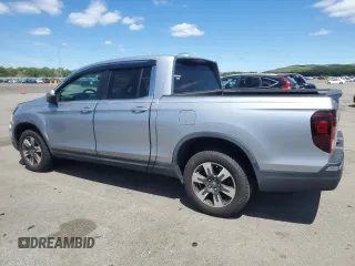 2017 Honda Ridgeline RTL-T with VIN 5FPYK3F65HB012868, listed as a Copart auction lot 57562885 with 115,530 mi miles and Salvage title. Bid and sale history available at DreamBid. Image 2.