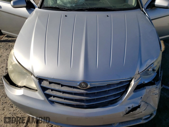 2008 Chrysler Sebring Touring z VIN 1C3LC56K18N269833, wystawiony jako Copart lot #53108565 z przebiegiem Nie podano mil oraz Szkoda całkowita • Salvage title. Historia ofert i sprzedaży dostępna na DreamBid. Obrazek 13.