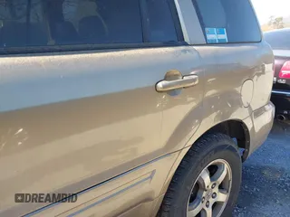2008 Honda Pilot EX-L with VIN 5FNYF18778B052859, listed as a IAAI auction lot 41695095 with 249,207 mi miles and . Bid and sale history available at DreamBid. Image 16.
