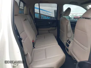 2019 Honda Ridgeline RTL-E with VIN 5FPYK3F78KB018356, listed as a IAAI auction lot 41946363 with 61,472 mi miles and . Bid and sale history available at DreamBid. Image 8.