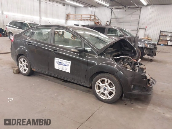 2014 Ford Fiesta SE with VIN 3FADP4BJ9EM212156, listed as a IAAI auction lot 41791690 with 92,760 mi miles and . Bid and sale history available at DreamBid. Image 1.