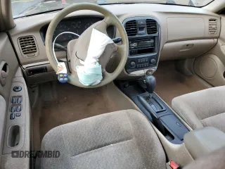 2001 Kia Optima LX z VIN KNAGD126315028712, wystawiony jako Copart lot #85302564 z przebiegiem 81 722 mil mil oraz Nie do naprawy • Non repairable. Historia ofert i sprzedaży dostępna na DreamBid. Obrazek 8.