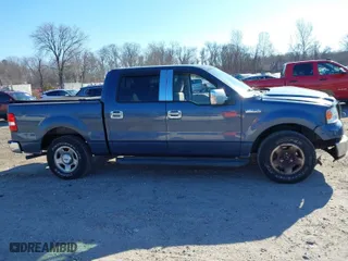 2004 Ford F-150 XLT with VIN 1FTRW12W44KD01717, listed as a IAAI auction lot 41252201 with 118,157 mi miles. Bid and sale history available at carsss.com. Image 13.