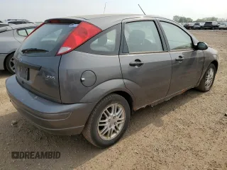 2005 Ford Focus S with VIN 3FAFP37NX5R134987, listed as a Copart auction lot 60478825 with 204,927 mi miles and Clean title. Bid and sale history available at DreamBid. Image 3.