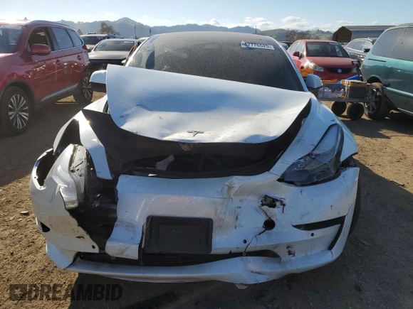 2021 Tesla Model 3 Standard Range Plus with VIN 5YJ3E1EA0MF017765, listed as a Copart auction lot 42776525 with 54,873 mi miles and Salvage Title. Bid and sale history available at carsss.com. Image 5.