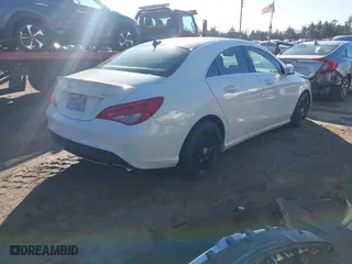 2015 Mercedes-Benz CLA-Class CLA 250 with VIN WDDSJ4GB4FN215340, listed as a IAAI auction lot 41758315 with 105,590 mi miles. Bid and sale history available at carsss.com. Image 4.