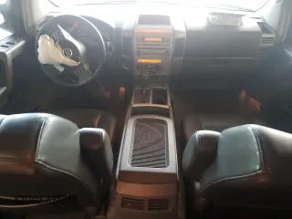 2006 Nissan Titan LE с VIN 1N6BA07A56N546452, выставлен на аукционе Copart как лот 56642845 с пробегом 161 494 миль миль и Списание • Salvage title. История ставок и продаж доступна на DreamBid. Изображение 8.