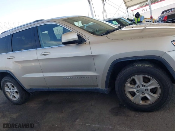 2014 Jeep Grand Cherokee Laredo with VIN 1C4RJFAG7EC380544, listed as a IAAI auction lot 42021130 with 166,589 mi miles. Bid and sale history available at carsss.com. Image 13.