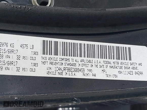 2014 Jeep Patriot Latitude with VIN 1C4NJRFB6ED689459, listed as a IAAI auction lot 42197469 with 202,899 mi miles. Bid and sale history available at carsss.com. Image 9.