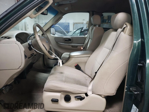 2002 Ford F-150 XL with VIN 1FTRX17L22NB97610, listed as a Copart auction lot 47186355 with 70,767 mi miles and Salvage title. Bid and sale history available at DreamBid. Image 7.