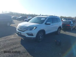 2017 Honda Pilot Elite with VIN 5FNYF6H00HB032386, listed as a IAAI auction lot 41976702 with 153,251 mi miles and . Bid and sale history available at DreamBid. Image 17.