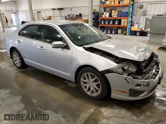 2012 Ford Fusion SEL with VIN 3FAHP0JG2CR274840, listed as a Copart auction lot 62123135 with 122,517 mi miles and Salvage title. Bid and sale history available at DreamBid. Image 4.