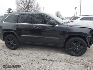 2015 Jeep Grand Cherokee Altitude with VIN 1C4RJFAG1FC210908, listed as a IAAI auction lot 41550173 with 168,905 mi miles. Bid and sale history available at carsss.com. Image 14.