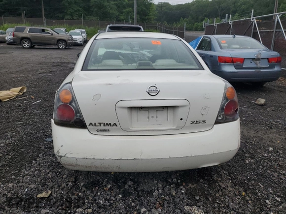 2003 Nissan Altima S z VIN 1N4AL11D23C170243, wystawiony jako Copart lot #60780585 z przebiegiem Nie podano mil oraz Szkoda całkowita • Salvage title. Historia ofert i sprzedaży dostępna na DreamBid. Obrazek 6.