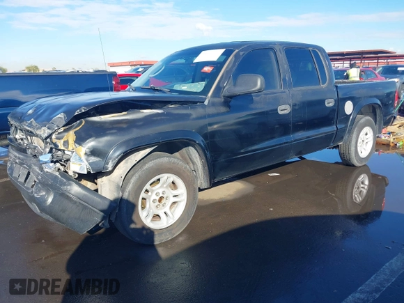 2003 Dodge Dakota Sport with VIN 1D7HL38X53S381338, listed as a IAAI auction lot 38840426 with 130,846 mi miles. Bid and sale history available at carsss.com. Image 17.
