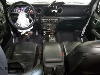 2021 Jeep Wrangler Unlimited Sahara с VIN 1C4JJXP61MW868399, выставлен на аукционе Copart как лот 49039445 с пробегом 35 387 миль миль и На запчасти • Non repairable. История ставок и продаж доступна на DreamBid. Изображение 8.