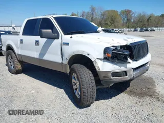 2005 Ford F-150 XLT with VIN 1FTPW12525KF04265, listed as a IAAI auction lot 41863650 with 215,895 mi miles. Bid and sale history available at carsss.com. Image 1.