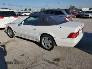 1999 Mercedes-Benz SL-Class with VIN WDBFA68F3XF183399, listed as a Copart auction lot 76908024 with 136,337 mi miles and Salvage Title. Bid and sale history available at carsss.com. Image 2.