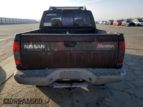 2000 Nissan Frontier XE z VIN 1N6ED27Y2YC369211, wystawiony jako Copart lot #80594884 z przebiegiem 225 194 mil mil oraz Czysty tytuł • Clean title. Historia ofert i sprzedaży dostępna na DreamBid. Obrazek 6.