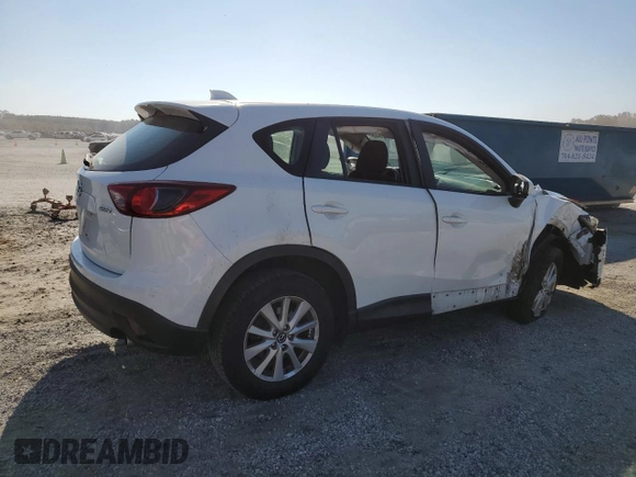 2013 Mazda CX-5 Sport z VIN JM3KE4BEXD0158031, wystawiony jako Copart lot #77827644 z przebiegiem Nie podano mil oraz Szkoda całkowita • Salvage title. Historia ofert i sprzedaży dostępna na DreamBid. Obrazek 3.