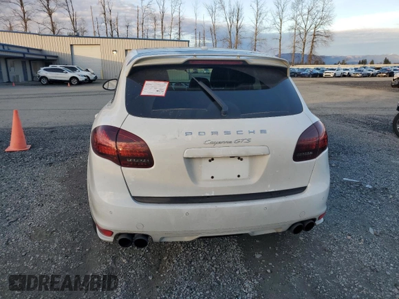 2014 Porsche Cayenne GTS z VIN WP1AD2A21ELA78053, wystawiony jako Copart lot #87922985 z przebiegiem 80 046 mil mil oraz Szkoda całkowita • Salvage title. Historia ofert i sprzedaży dostępna na DreamBid. Obrazek 6.