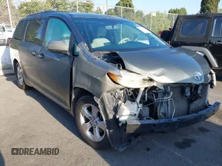 2013 Toyota Sienna LE AAS with VIN 5TDKK3DC0DS313786, listed as a IAAI auction lot 41981268 with 162,423 mi miles. Bid and sale history available at carsss.com. Image 1.