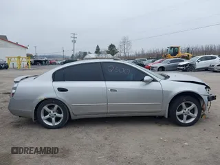 2005 Nissan Altima SE with VIN 1N4BL11E65C133566, listed as a IAAI auction lot 41792300 with 169,733 mi miles. Bid and sale history available at carsss.com. Image 13.