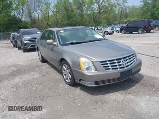 2006 Cadillac DTS 1SD z VIN 1G6KD57Y06U197794, wystawiony jako IAAI lot #42226706 z przebiegiem 135 748 mil mil oraz . Historia ofert i sprzedaży dostępna na DreamBid. Obrazek 1.