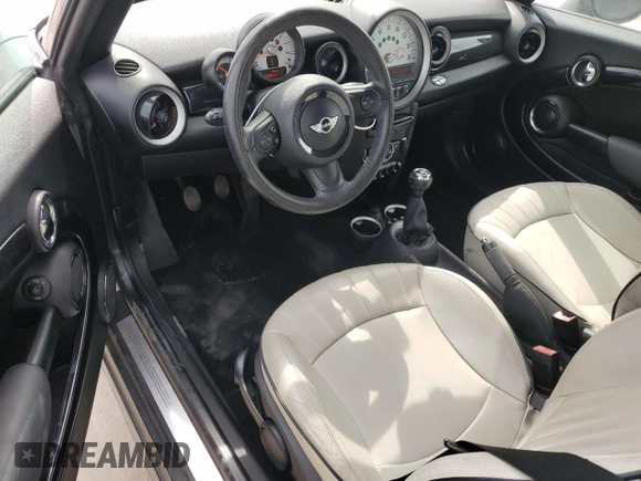 2011 MINI Convertible with VIN WMWZN3C53BTZ89332, listed as a Copart auction lot 45945515 with 25,809 mi miles and Salvage title. Bid and sale history available at DreamBid. Image 8.