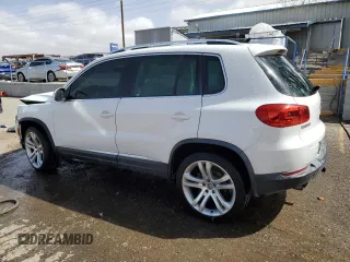 2012 Volkswagen Tiguan SE with VIN WVGAV7AX1CW530016, listed as a Copart auction lot 48551935 with 102,455 mi miles and Salvage Title. Bid and sale history available at DreamBid. Image 2.